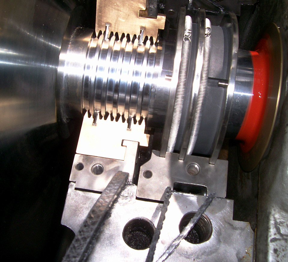 Augmented labyrinth brush seal installed in process steam turbine