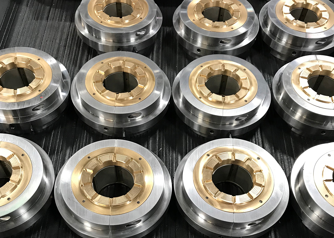 Compound taper thrust bearing in combination with a tilt pad journal bearing