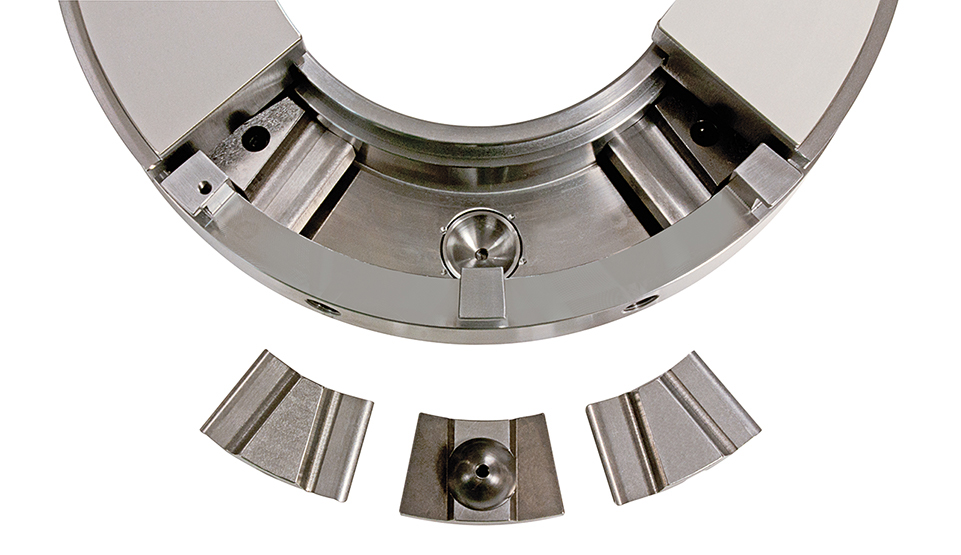 Tilt pad components of a ball and socket thrust bearing