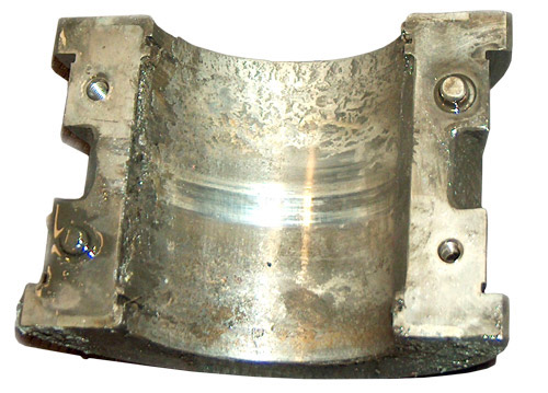 Corrosion damage on a fixed profile journal bearing